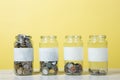 Glass jars with coins Royalty Free Stock Photo