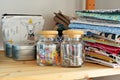 Glass jars, colorful clips, metal pins and cotton fabrics