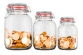 Glass jars with growing amount of gold coins. Savings and profit, concept. 3D rendering Royalty Free Stock Photo