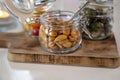 Glass jars with healthy party snacks served in bar, tasty appetisers