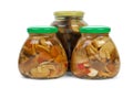 Glass jars with marinated mushrooms