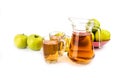 Glass and a jug of apple juice , isolated on white background Royalty Free Stock Photo