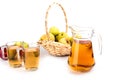 Glass and a jug of apple juice , isolated on white background Royalty Free Stock Photo