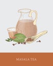 Glass jug, cup of masala chai or traditional spiced Indian tea, spoon, cardamon and cloves on gray background. Tasty