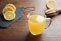 Glass jug with fresh lemon juice Royalty Free Stock Photo