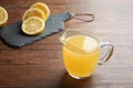 Glass jug with fresh lemon juice Royalty Free Stock Photo