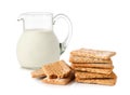 Glass jug with milk and cracker Royalty Free Stock Photo