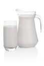 Glass and jug of milk isolated on white background Royalty Free Stock Photo