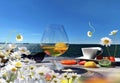 Glass of juice ,cup of coffee, exotic fruits and berry sunglasses on  wooden table ,beach cafe resort and  flowers daisy and laven Royalty Free Stock Photo