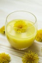 Glass of juice, decorated with flowers Royalty Free Stock Photo