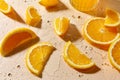 Glass of juice and orange slices on wet table Royalty Free Stock Photo