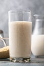 A glass of kefir with oat bran close-up. Concept on the topic of a useful beverage for digestion