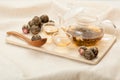 Glass kettle and two bowls for chinese tea. Royalty Free Stock Photo