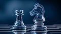 Glass knight and rook chess pieces on board with blue background. Royalty Free Stock Photo