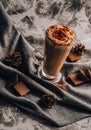 Glass of Latte Macchiato, Delicious hot chocolate, Cup of coffee with cinnamon, chocolate and cream Royalty Free Stock Photo