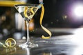 Glass of lemon drop martini cocktail on bar counter. Royalty Free Stock Photo