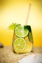 A glass of lemonade on the beach Royalty Free Stock Photo