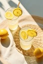 Glass lemonade cold summer beverage ice refreshing fresh green martini lemon cocktail drink Royalty Free Stock Photo