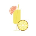 A glass of lemonade with a grapefruit slice, pineapple slice and straws. Royalty Free Stock Photo