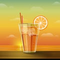 Glass with lemonade at sunset Royalty Free Stock Photo
