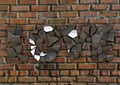 Glass letters broken on a brick wall