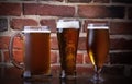 Glass of light beer on a dark pub. Royalty Free Stock Photo