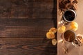 A glass of light and a glass of dark beer and snacks on a wooden brown table with a place for inscription. Royalty Free Stock Photo