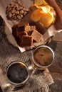 A glass of light and a glass of dark beer and snacks on a wooden brown table. Royalty Free Stock Photo