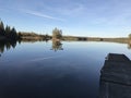 Glass like view of the water of Lake of the Woods Royalty Free Stock Photo