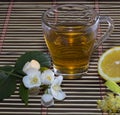 Glass of lime tea with a lemon close up Royalty Free Stock Photo