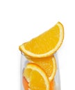 Glass with lobule orange fruits Royalty Free Stock Photo