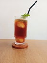 a glass of lychee iced tea garnished with mint leaves Royalty Free Stock Photo