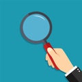 Glass magnify in hand. Lens of magnifying loupe for search. Cartoon zoom for detective. Man hold magnifier, focus for enlarge. Royalty Free Stock Photo