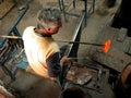 Glass making artisan in his workshop Royalty Free Stock Photo