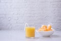 Kitchen table with glass of mangoes juice and mangoes jelly