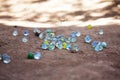 Glass Marbles on the road, Satara,