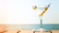 Glass of martini bianco at the wooden pier. Concept of summer va