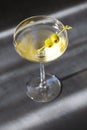 Glass with martini and green olives Royalty Free Stock Photo