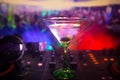 Glass with martini with olive inside on dj controller in night club. Dj Console with club drink at music party in nightclub with d Royalty Free Stock Photo