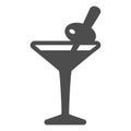 Glass of Martini with olive on toothpick solid icon, bar concept, vermouth cocktail vector sign on white background Royalty Free Stock Photo
