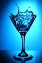 Glass martini and splash Royalty Free Stock Photo