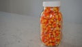 Mason jar full of candy corn on the counter Royalty Free Stock Photo