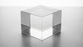 The glass material emphasizes the geometric simplicity and elegance of the cube Royalty Free Stock Photo