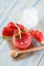 Glass of melon smoothie and glass of ice Royalty Free Stock Photo