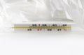 Glass mercury thermometer with celsius degree and napkins. Thermometer close-up on white background. Illness, high temperature