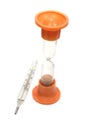 Glass mercury thermometer and Sandglass isolated o