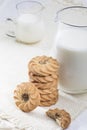 Glass of milk and cookies isolated on white Royalty Free Stock Photo