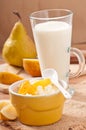 Glass of milk and cottage cheese in bowl Royalty Free Stock Photo