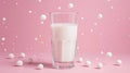 Glass of milk with floating white sugar-coated candies on pink background. World Milk Day Royalty Free Stock Photo