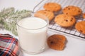 Glass of milk, homemade cookies for Santa on the white background